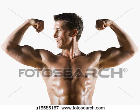 Stock Photo - Male body builder flexing and posing. Fotosearch