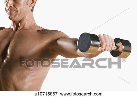 Stock Photo - Male body builder flexing lifting weight. Fotosearch