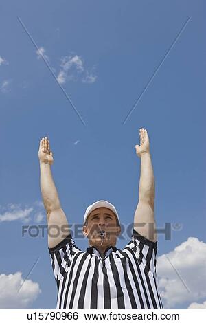 Male football referee making touchdown call View Large Photo Image Stock Photograph - Male football referee making touchdown call. Fotosearch