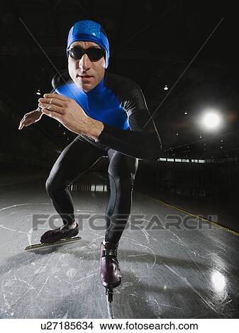 Male speed skater on ice View Large Photo Image Picture - Male speed skater on ice. Fotosearch
