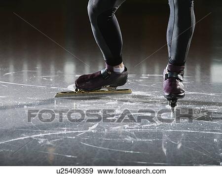 Male speed skater on ice View Large Photo Image Stock Photo - Male speed skater on ice. Fotosearch