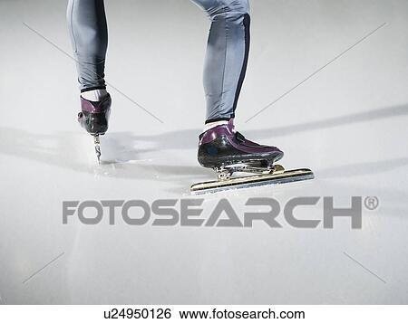 Male speed skater on ice View Large Photo Image Stock Photograph - Male speed skater on ice. Fotosearch