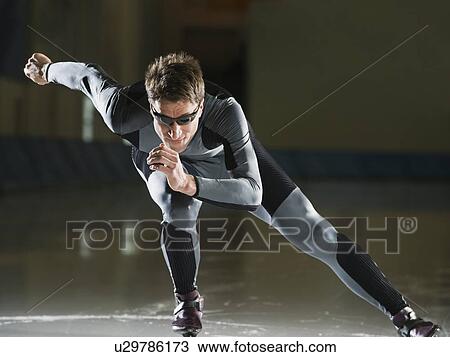 Stock Image - Male speed skater skating. Fotosearch