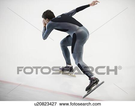 Male speed skater skating View Large Photo Image Stock Photo - Male speed skater skating. Fotosearch