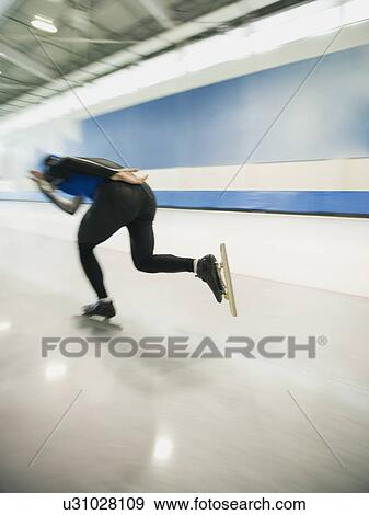 Male speed skater skating View Large Photo Image Stock Photo - Male speed skater skating. Fotosearch