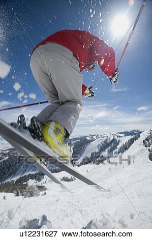 Man in air on skis View Large Photo Image Stock Photo - Man in air on skis. Fotosearch