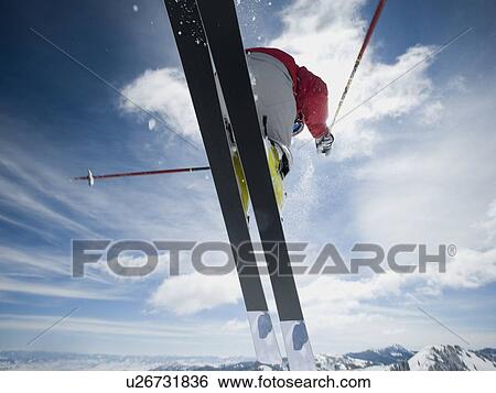 Man in air on skis View Large Photo Image Stock Photograph - Man in air on skis. Fotosearch