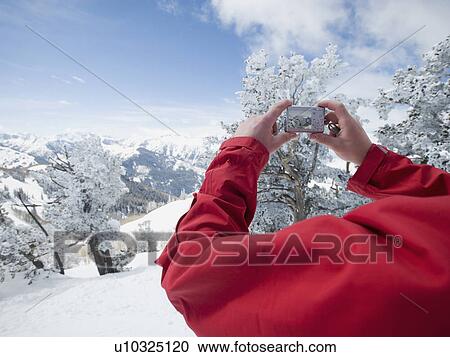 Man taking photograph, Wasatch Mountains, Utah, United States View Large Photo Image Stock Image - Man taking photograph, Wasatch Mountains, Utah, United States. Fotosearch