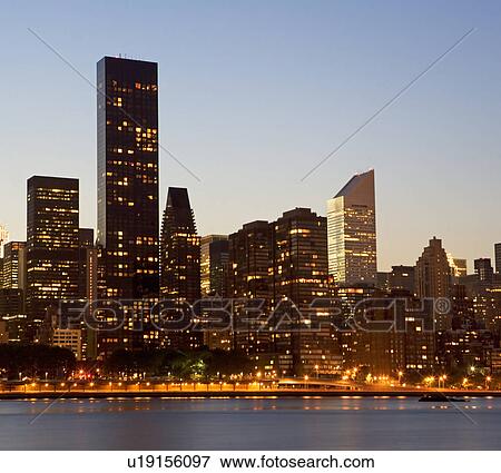 Stock Photo - Manhattan skyline at dusk. Fotosearch