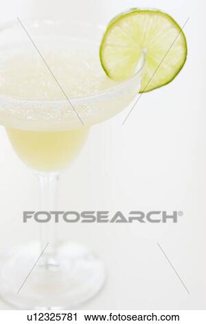 Stock Image - Margarita garnished with lime. Fotosearch