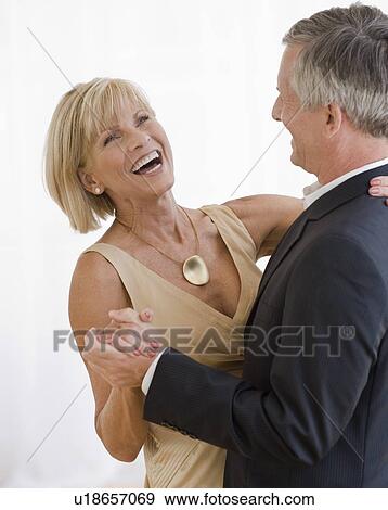 Mature couple dancing View Large Photo Image Stock Photo - Mature couple dancing. Fotosearch