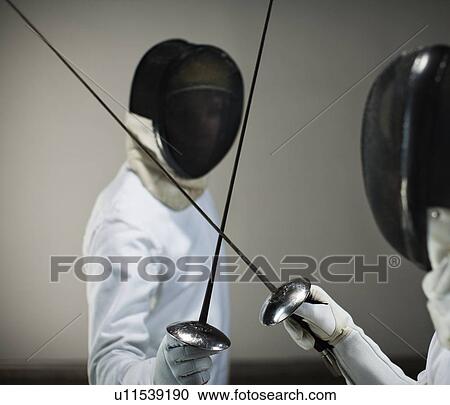 Men fencing View Large Photo Image Stock Image - Men fencing. Fotosearch