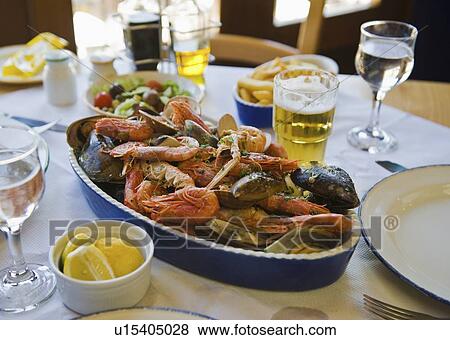 Mixed seafood on restaurant table View Large Photo Image Stock Photo - Mixed seafood on restaurant table. Fotosearch