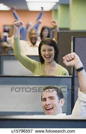Stock Photo - Multi-ethnic businesspeople cheering. Fotosearch