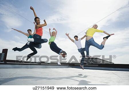 Stock Photo - Multi-ethnic group performing modern dance. Fotosearch