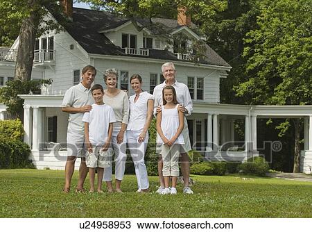 Multi-generational family posing in front yard View Large Photo Image Stock Image - Multi-generational family posing in front yard. Fotosearch