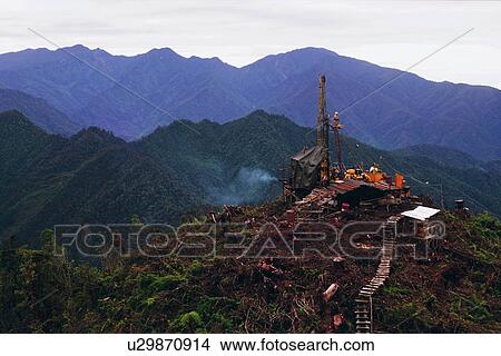 Picture - Oil drilling platform in Jayawijaya Mountains, Indonesia. Fotosearch