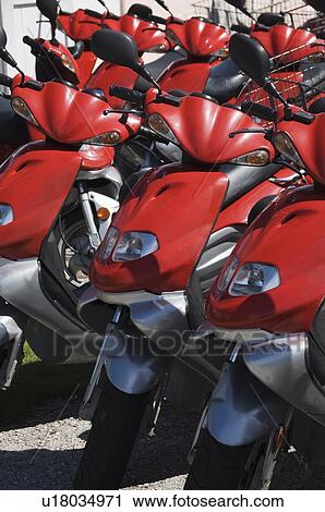 Parked scooters View Large Photo Image Stock Image - Parked scooters. Fotosearch