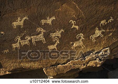 Picture - Petroglyph of Wolf Ranch in Arches National Park, Utah. Fotosearch