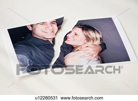 Stock Image - Photograph of couple ripped in half. Fotosearch