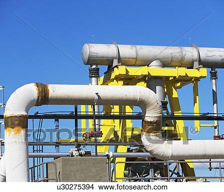 Picture - Pipeline at water treatment plant. Fotosearch