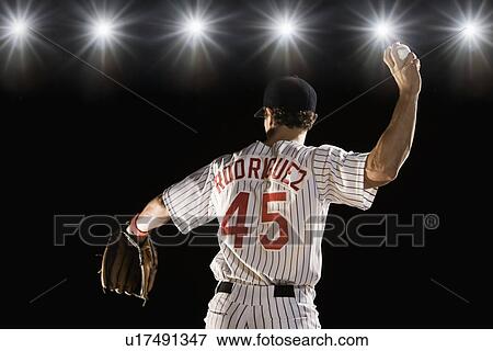 Pitcher throwing baseball View Large Photo Image Stock Photo - Pitcher throwing baseball. Fotosearch