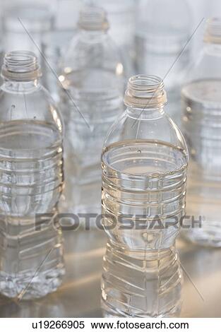 Plastic water bottles View Large Photo Image Stock Photography - Plastic water bottles. Fotosearch