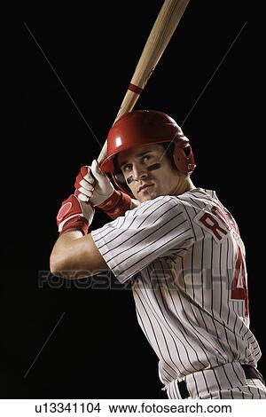 Picture - Portrait of baseball player in batting stance. Fotosearch