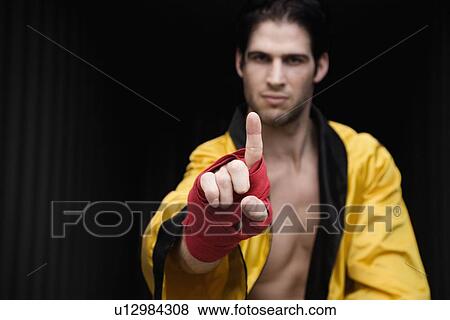Portrait of boxer with finger extended View Large Photo Image Stock Photo - Portrait of boxer with finger extended. Fotosearch