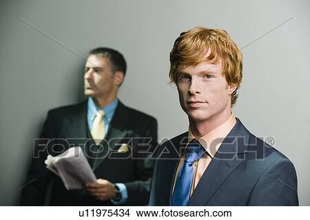 Picture - Portrait of confident businessmen. Fotosearch