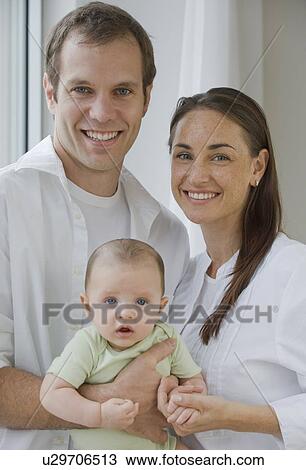 Stock Image - Portrait of couple and baby son. Fotosearch