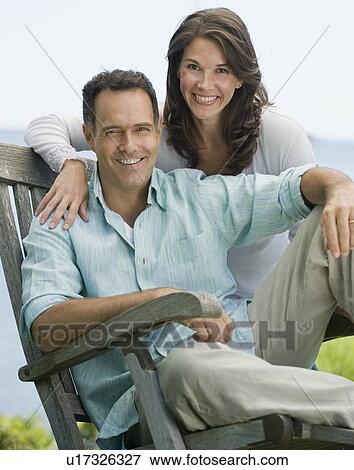 Stock Photo - Portrait of couple outdoors. Fotosearch