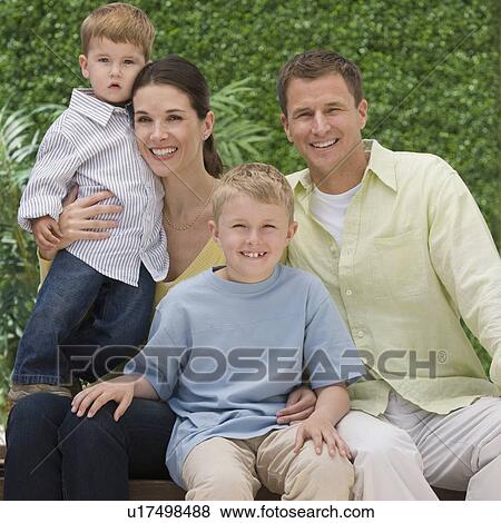 Portrait of family with two children View Large Photo Image Stock Photo - Portrait of family with two children. Fotosearch