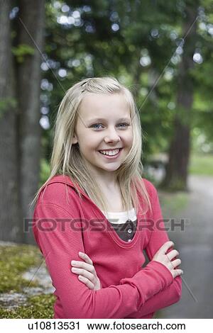 Portrait of girl in park View Large Photo Image Stock Image - Portrait of girl in park. Fotosearch