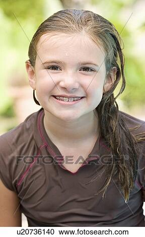 Portrait of girl in wet swimming shirt View Large Photo Image Stock Image - Portrait of girl in wet swimming shirt. Fotosearch