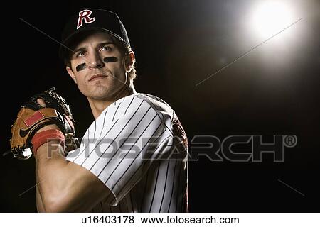 Portrait of pitcher preparing to throw ball View Large Photo Image Stock Photo - Portrait of pitcher preparing to throw ball. Fotosearch