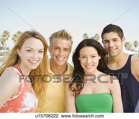 Portrait of two couples outdoors View Large Photo Image Stock Image - Portrait of two couples outdoors. Fotosearch