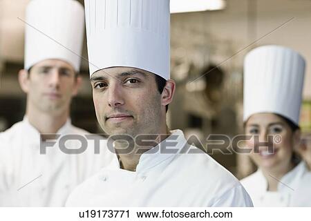 Stock Image - Professional chefs in uniforms. Fotosearch