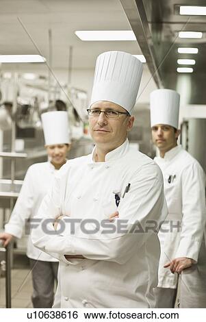 Stock Photograph - Professional chefs in uniforms. Fotosearch
