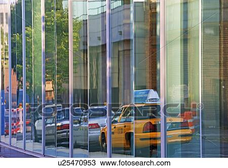 Reflection of taxi cab and cars on building View Large Photo Image Stock Image - Reflection of taxi cab and cars on building. Fotosearch