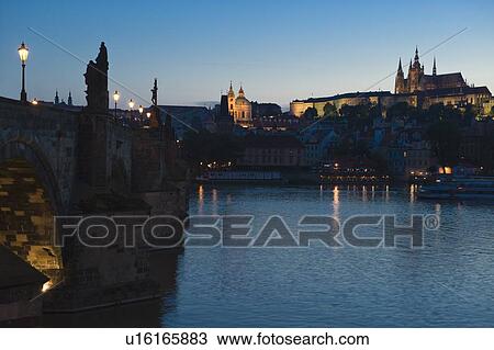 Stock Image - River and city at night. Fotosearch
