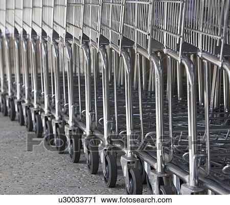 Row of shopping carts View Large Photo Image Stock Image - Row of shopping carts. Fotosearch