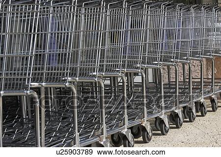Stock Photo - Row of shopping carts. Fotosearch