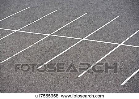 Stock Photo - Rows of empty parking spaces. Fotosearch