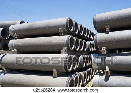 Rows of industrial sewer pipes View Large Photo Image Picture - Rows of industrial sewer pipes. Fotosearch
