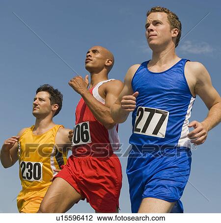 Runners in a row racing View Large Photo Image Stock Image - Runners in a row racing. Fotosearch