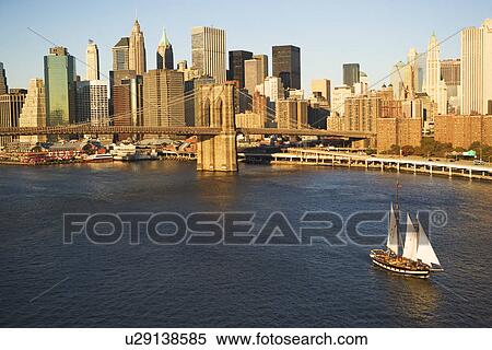 Stock Photography - Sailboat and New York City skyline. Fotosearch