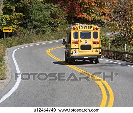 School bus driving down rural road View Large Photo Image Stock Photo - School bus driving down rural road. Fotosearch