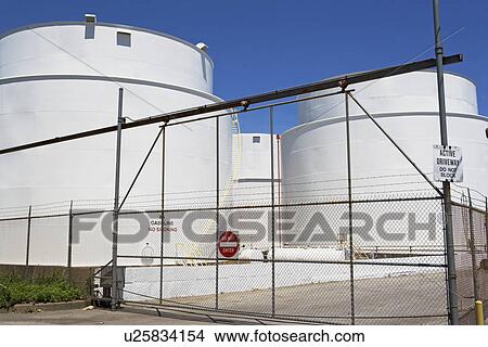 Picture - Secure oil storage tanks. Fotosearch