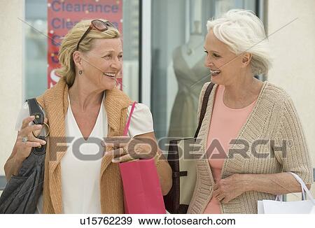 Senior woman shopping View Large Photo Image Stock Photo - Senior woman shopping. Fotosearch
